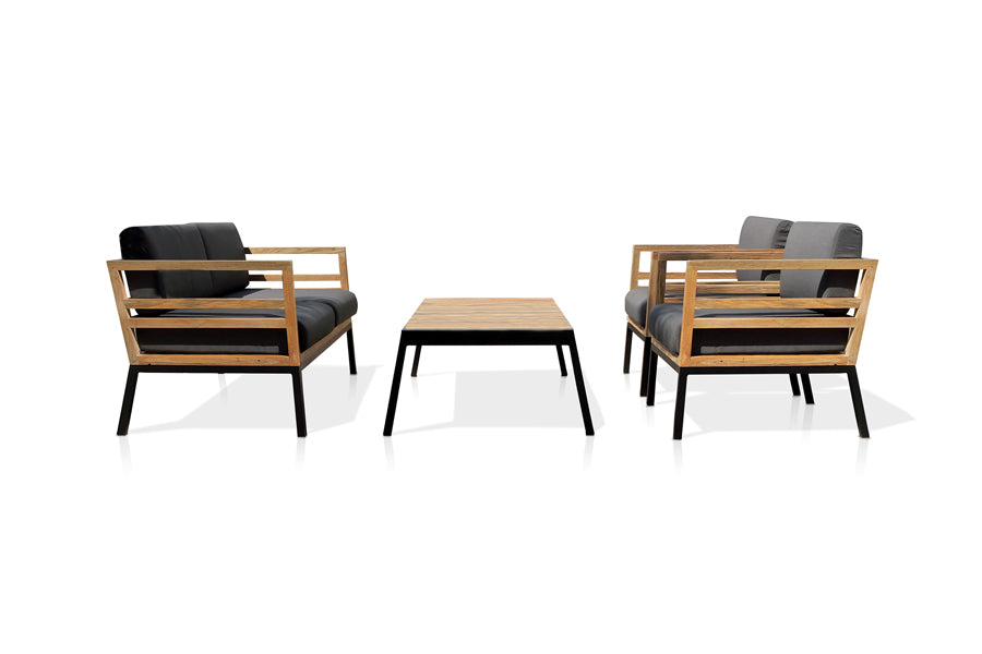 Zudu Coffee Table by Mamagreen, showing side view of zudu coffee table in black sand aluminum/smooth sanded recycled teak wood with 1-seaters & 2-seater.