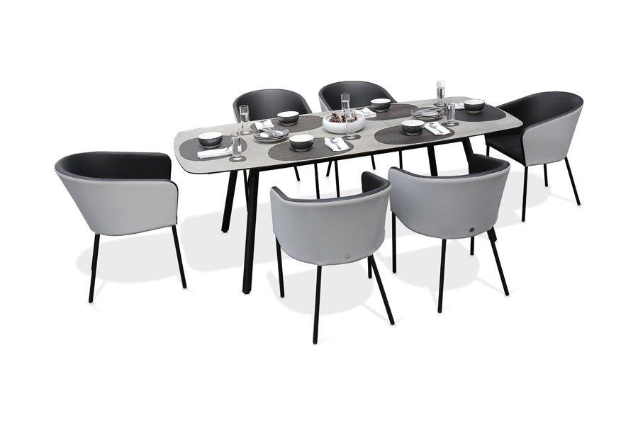 Zupy HPL 96" - 116" Extension Table by Mamagreen, showing angle view of zupy hpl 96" - 116" extension table in black sand aluminum/scratched grey hpl.