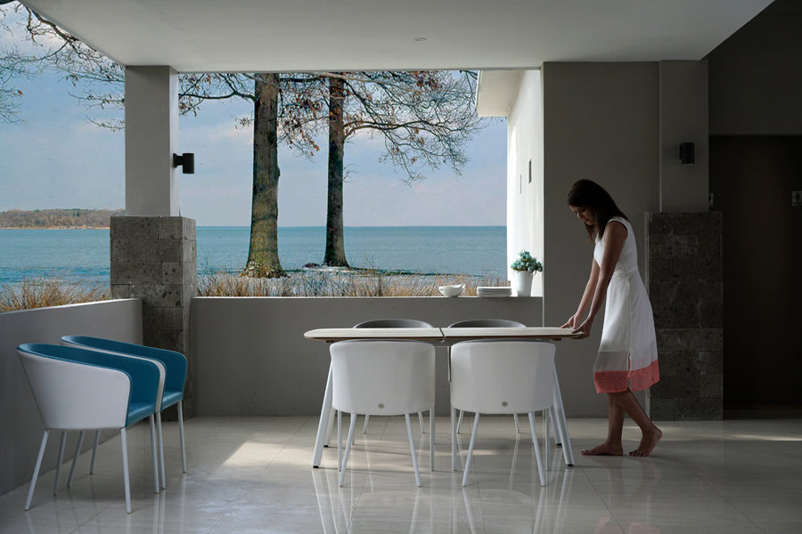 Zupy Teak Extension Table by Mamagreen, showing zupy teak extension table in live shot.