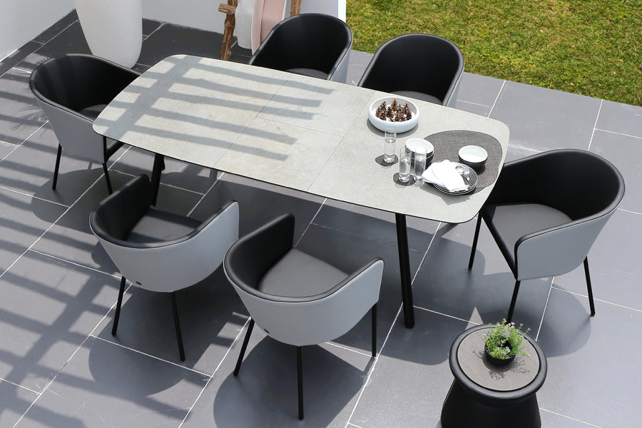 Zupy Twotone Stamskin-Leisuretex Dining Chair by Mamagreen, showing zupy twotone stamskin-leisuretex dining chairs in live shot.