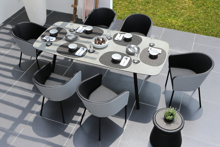 Zupy Twotone Stamskin-Leisuretex Dining Chair by Mamagreen, showing zupy twotone stamskin-leisuretex dining chairs in live shot.