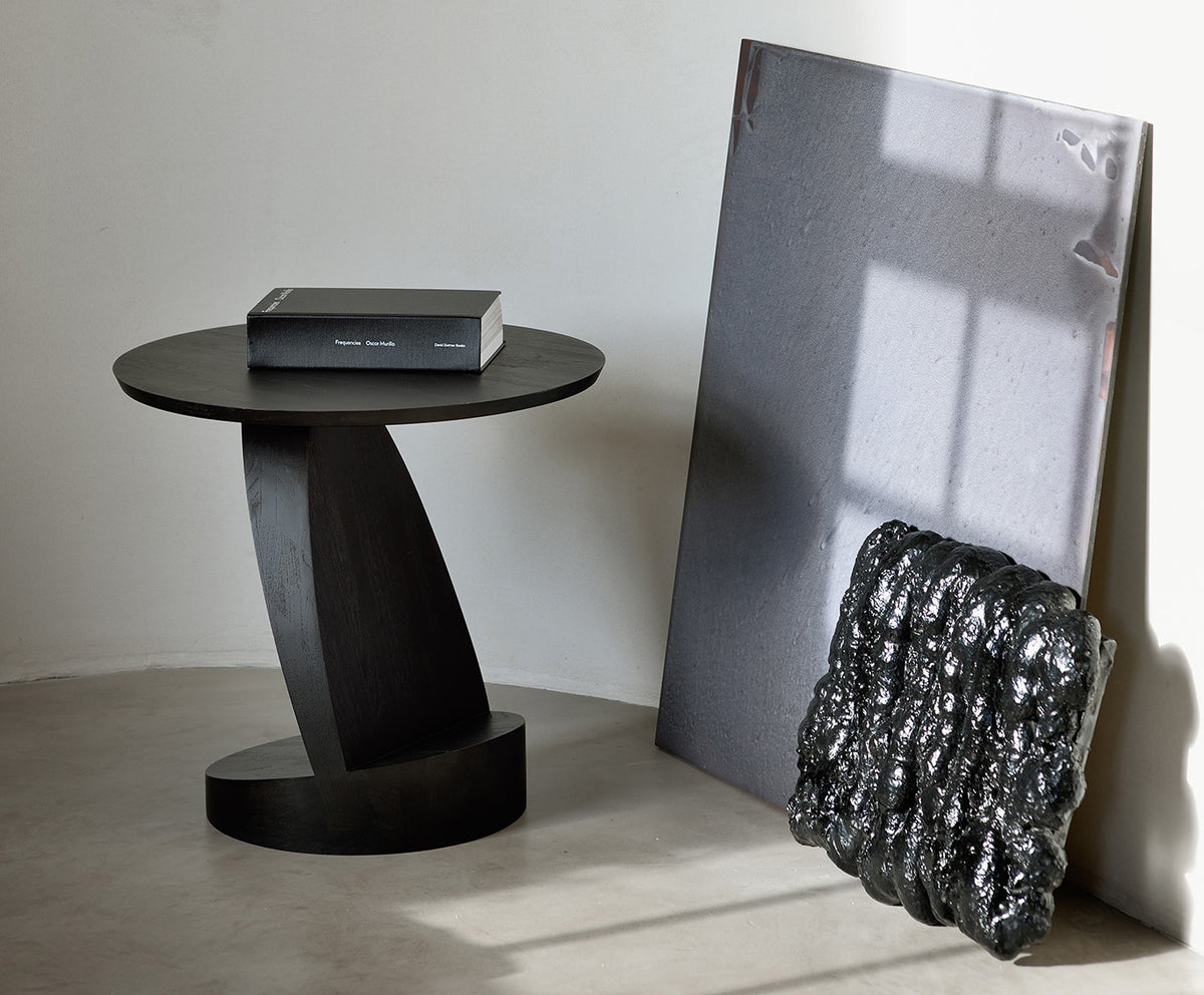 Oblic Side Table by Ethnicraft, showing oblic side table in live shot.