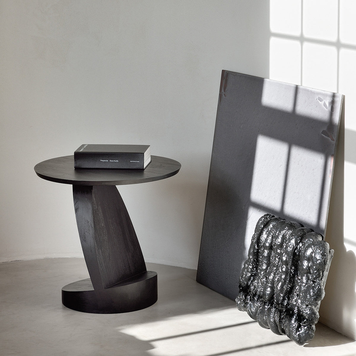 Oblic Side Table by Ethnicraft, showing oblic side table in live shot.