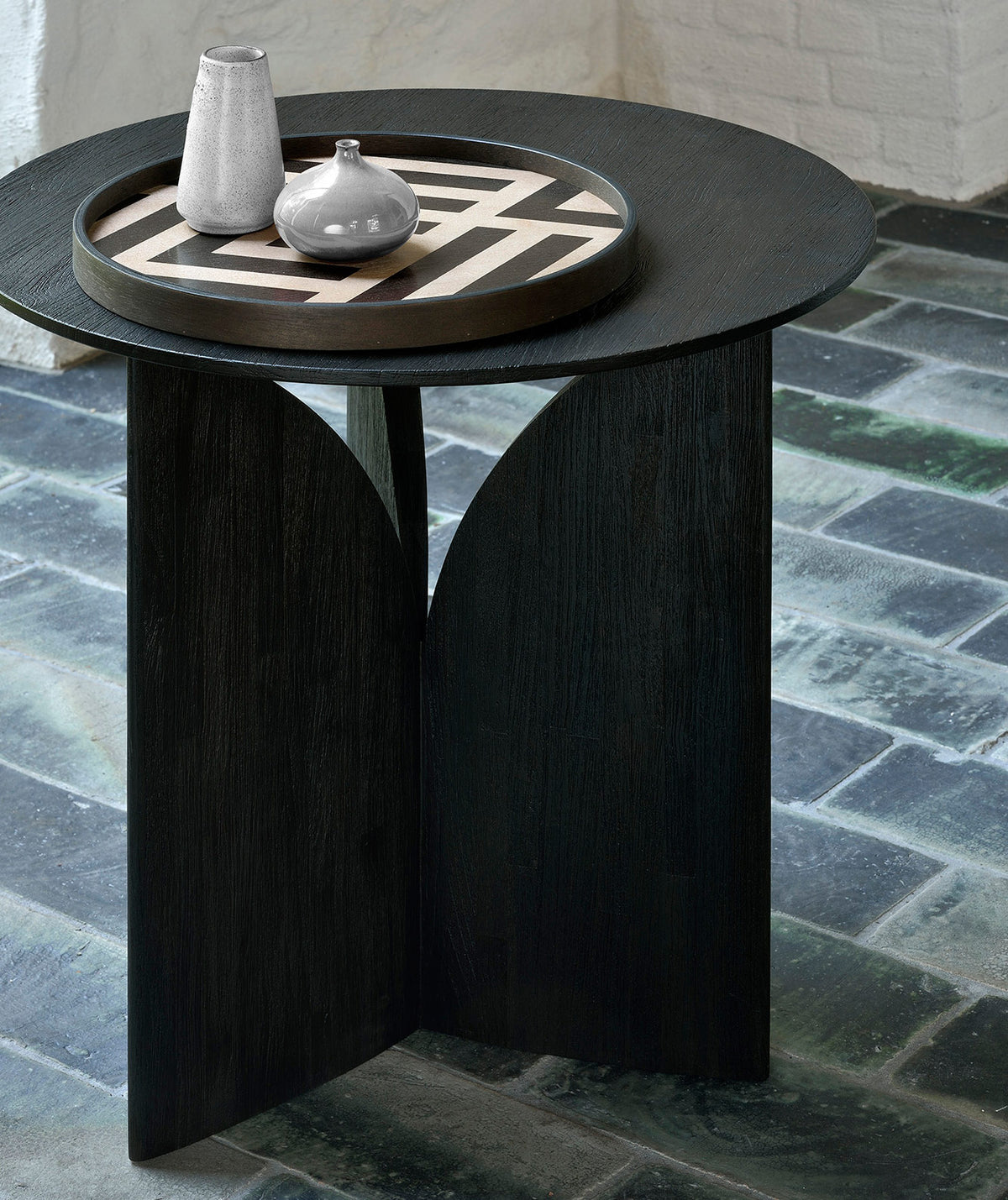 Fin Teak Black Varnished Side Table by Ethnicraft, showing angle view of teak black varnished side table in live shot.