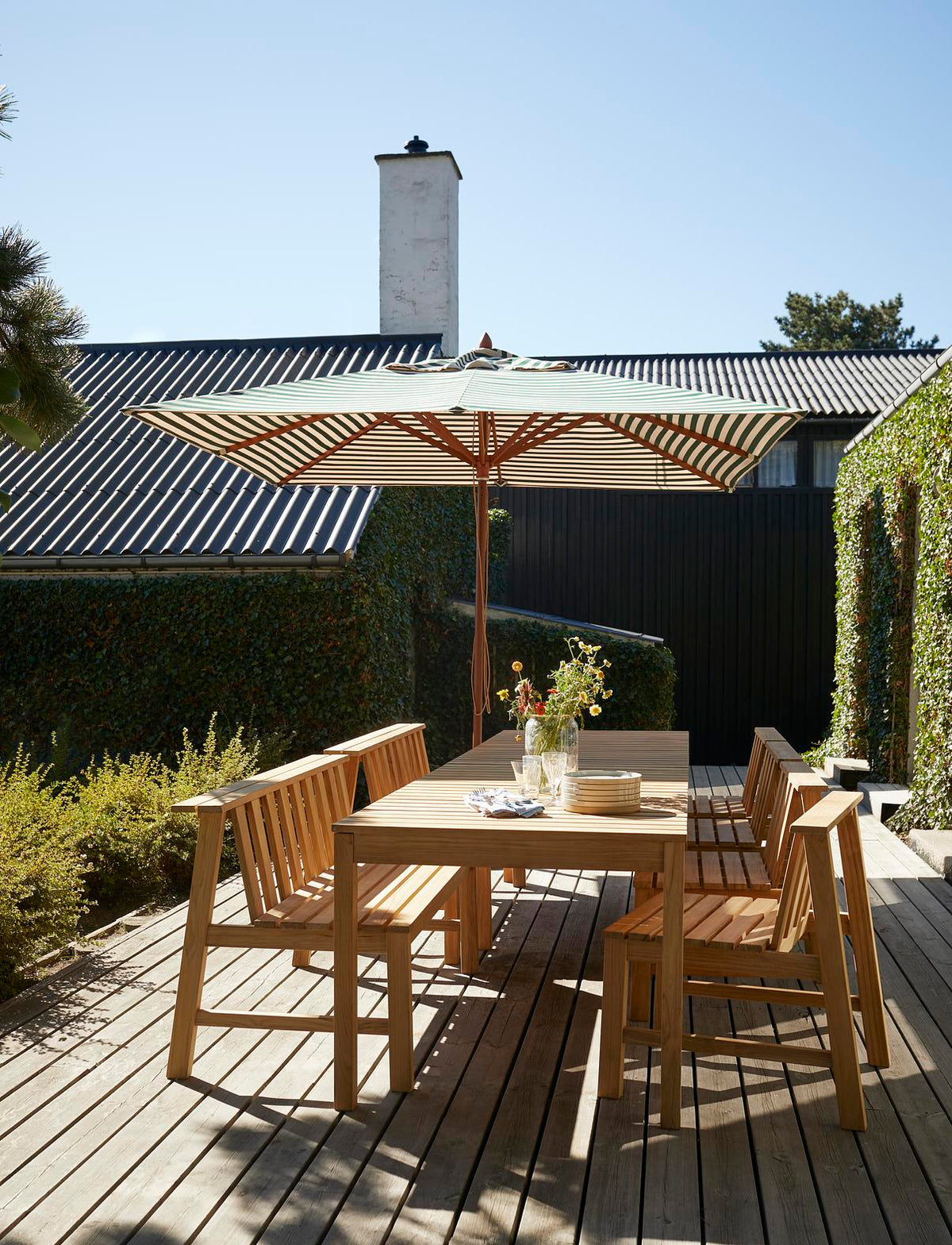 Messina Outdoor Umbrella by Skagerak, showing messina outdoor umbrella in live shot.