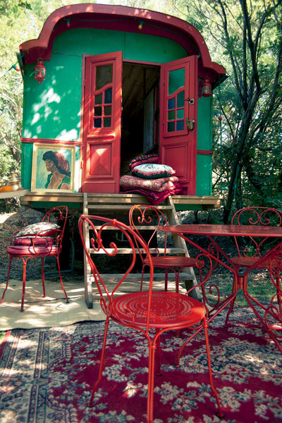 1900 Stacking Chair by Fermob, showing live shoot of the chair with table.