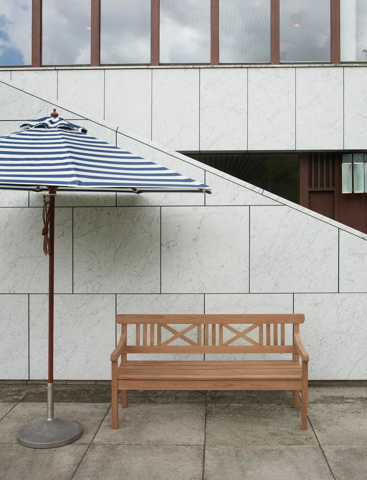 Messina Outdoor Umbrella by Skagerak, showing messina outdoor umbrella in live shot.