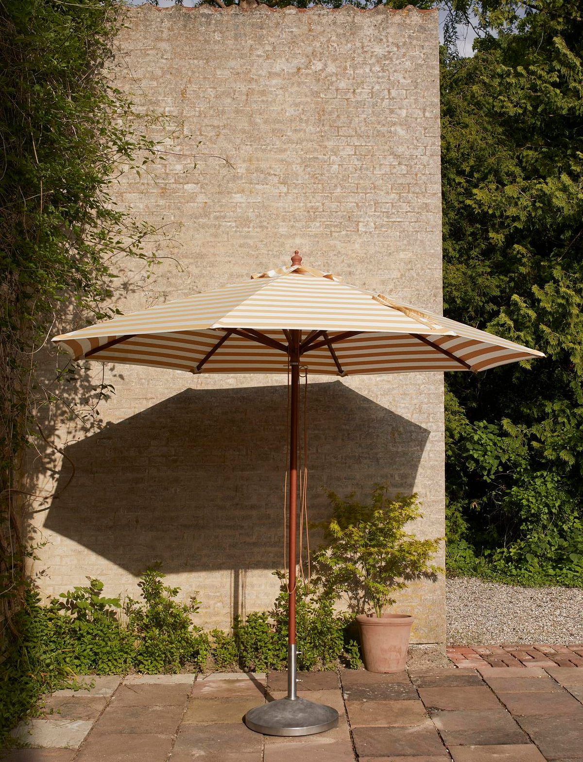 Messina Outdoor Umbrella by Skagerak, showing messina outdoor umbrella in live shot.