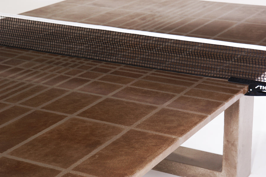 James De Wulf Inwards Fibonacci Ping Pong Dining Table by De Wulf, showing top view of inwards fibonacci ping pong dining table in dark grey concrete.