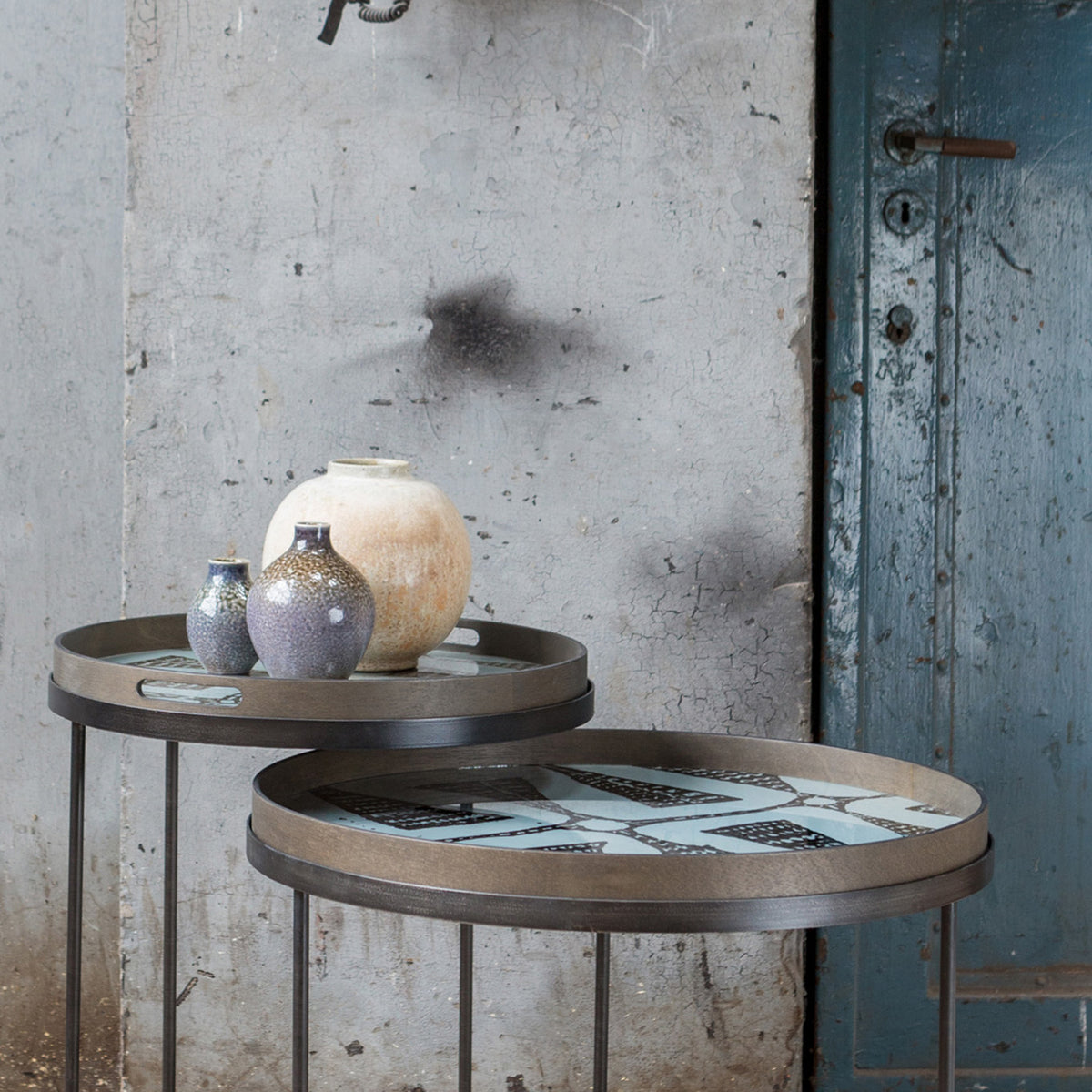Tray Side Table by Ethnicraft, showing closeup view of tray side table sets in live shot.