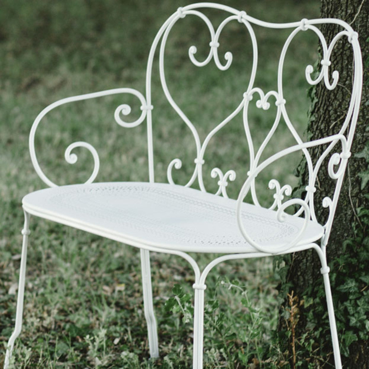 1900 Bench by Fermob, showing angle view of the bench in the live shot.