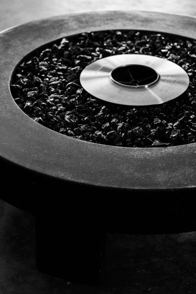 James De Wulf 3-Legged Fire Table by De Wulf, showing closeup view of 3-legged fire table.