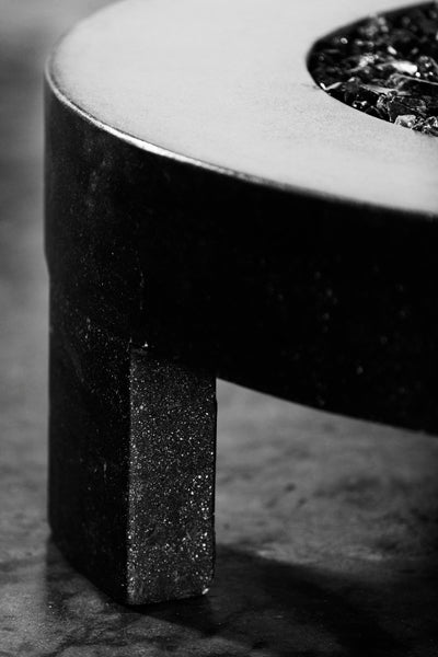 James De Wulf 3-Legged Fire Table by De Wulf, showing closeup view of 3-legged fire table.