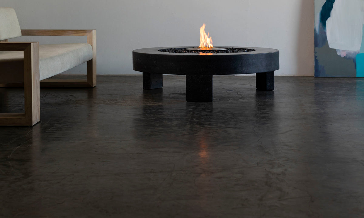 James De Wulf 3-Legged Fire Table by De Wulf, showing 3-legged fire table in live shot.
