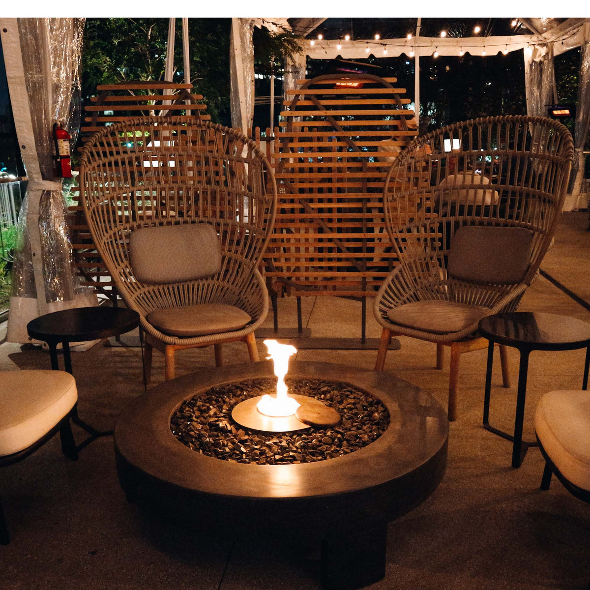 James De Wulf 3-Legged Fire Table by De Wulf, showing 3-legged fire table in live shot.