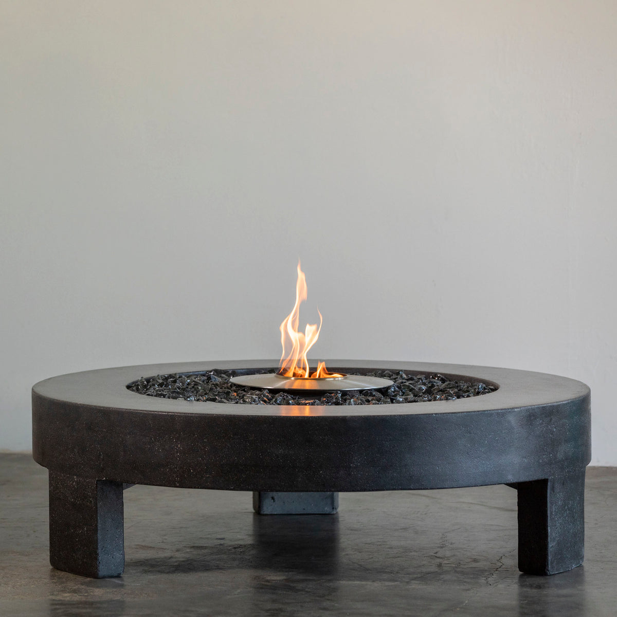 James De Wulf 3-Legged Fire Table by De Wulf, showing front view of 3-legged fire table.