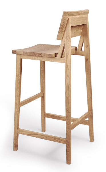 N4 Bar Stool by Ethnicraft, showing angle back view of n4 bar stool in natural oak.