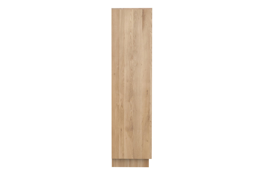 Wave Cupboard by Ethnicraft, showing side view of wave cupboard in oak.