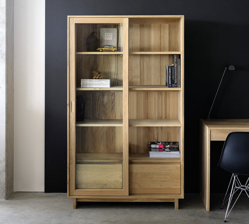 Wave Oak Book Rack by Ethnicraft, showing front view of oak book rack in live shot.