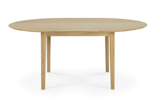 Oak Bok Round Extendable Dining Table by Ethnicraft, showing front view of bok round extendable dining table.