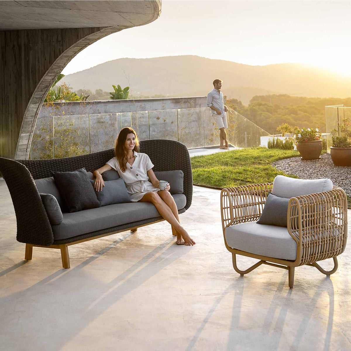 Nest Outdoor Lounge Chair by Cane-Line, showing nest outdoor lounge chair in the live shot.