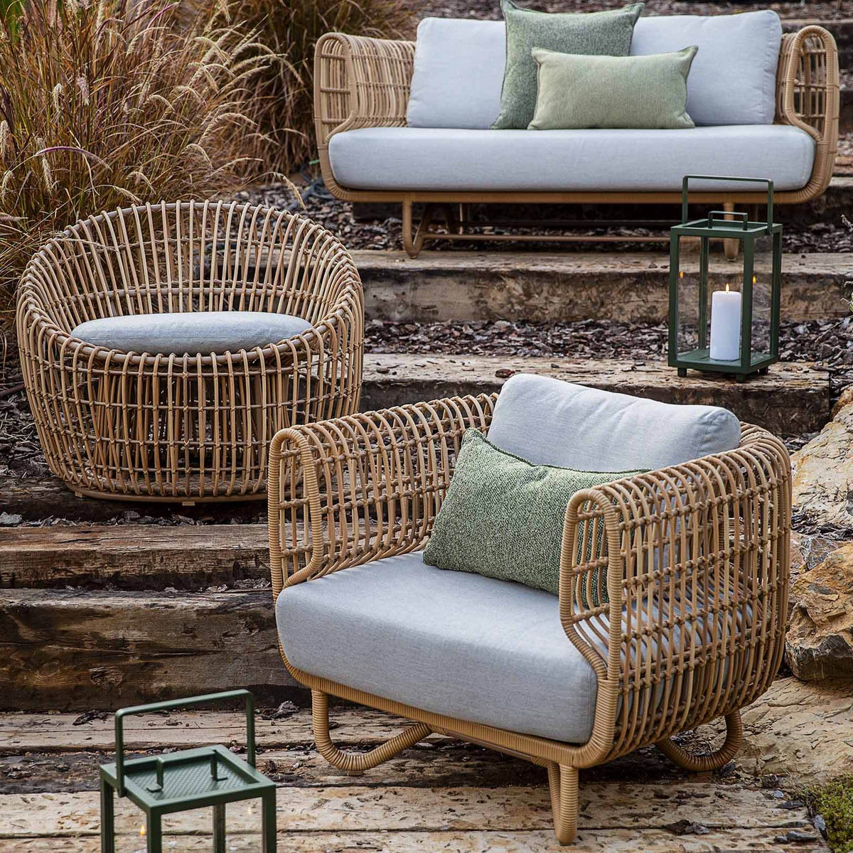 Nest Outdoor Lounge Chair by Cane-Line, showing nest outdoor lounge chair in the live shot.