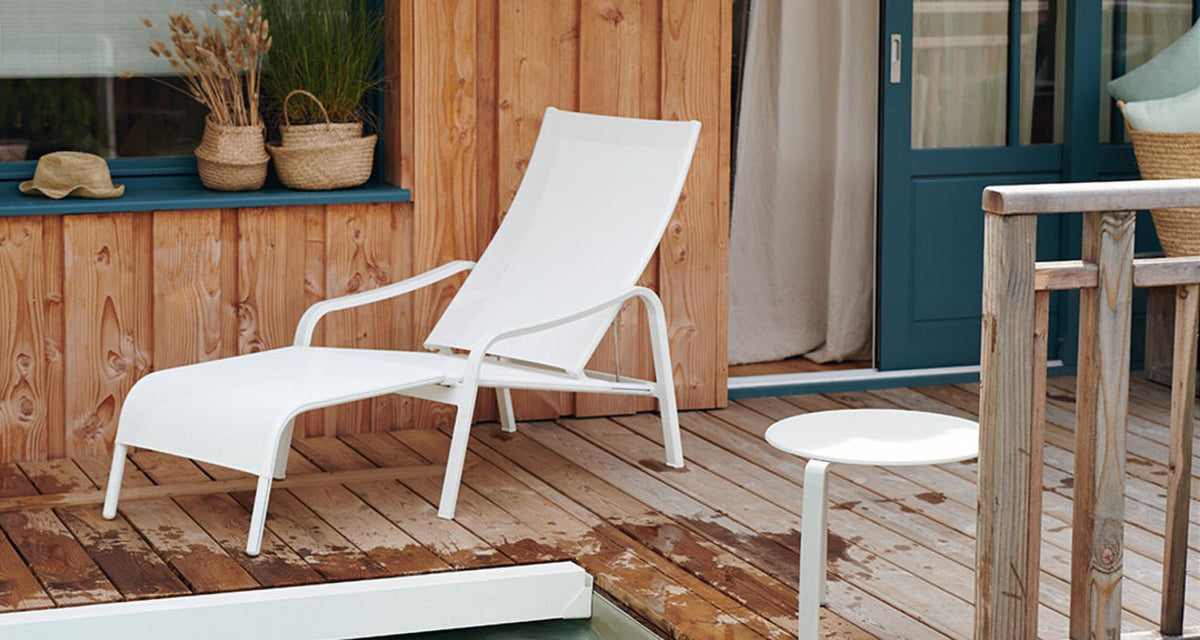 Alize Low Armchair by Fermob, showing alize low armchair in live shot.