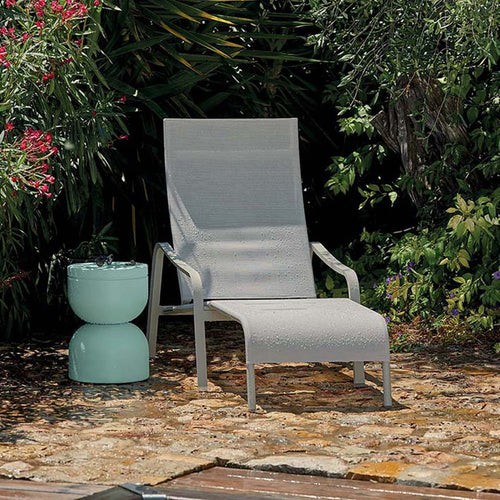 Alize Low Armchair by Fermob, showing alize low armchair in live shot.