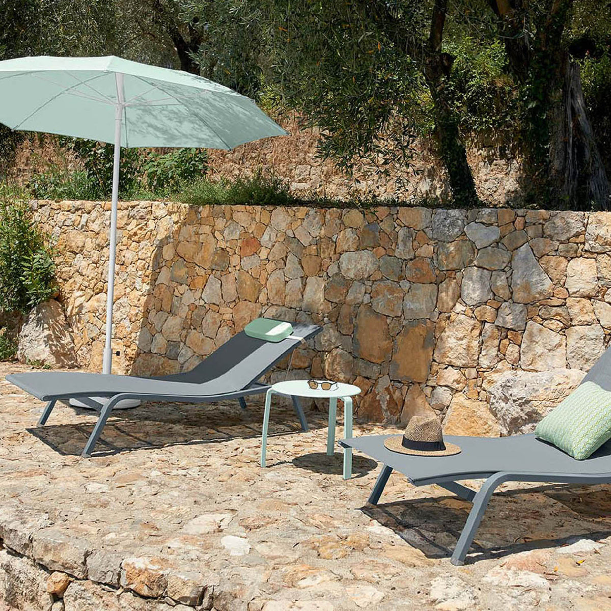 Alize Sunlounger by Fermob, showing alize sunlounger in live shot.