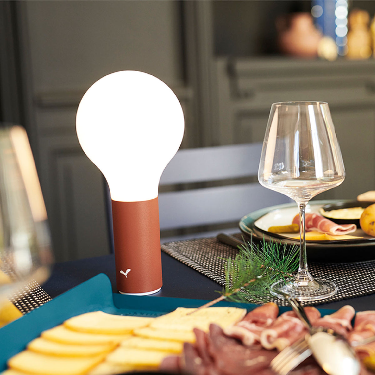 Aplo Lamp by Fermob, showing aplo lamp in live shot.