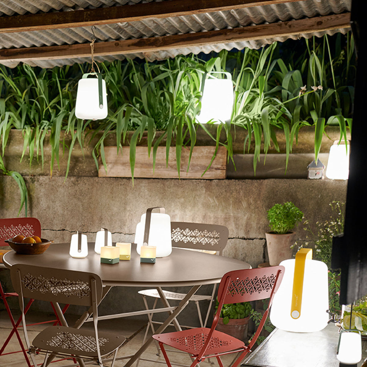 Balad Small Lamp (set of 3) by Fermob, showing balad small lamp in live shot.