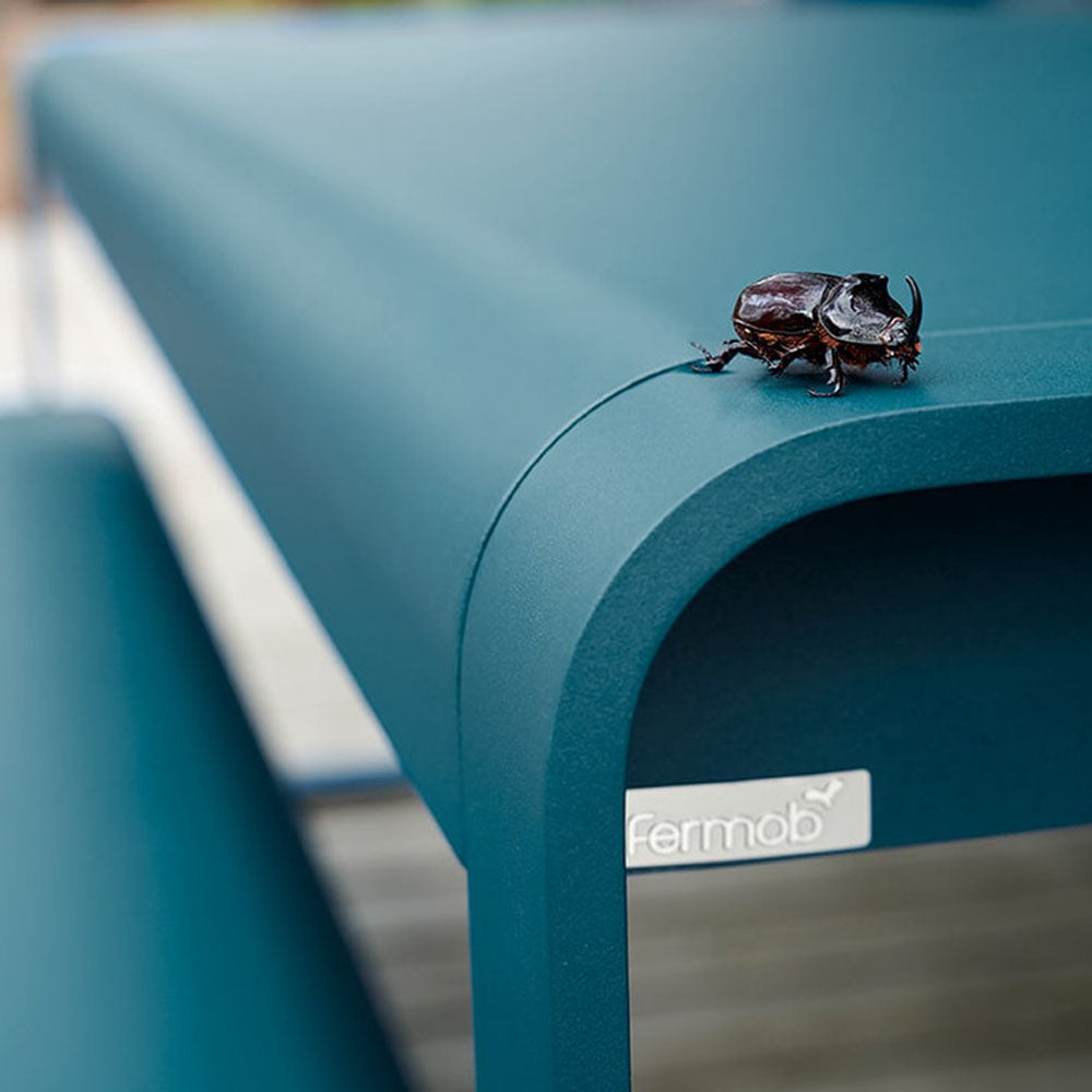 Bellevie Mid Height Table by Fermob, showing closeup view of bellevie mid height table in live shot.