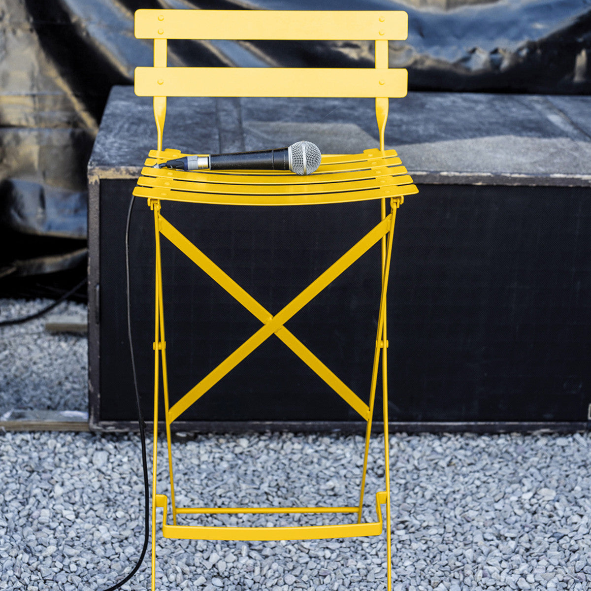 Bistro Bar Stool by Fermob, showig bistro bar stool in live shot.
