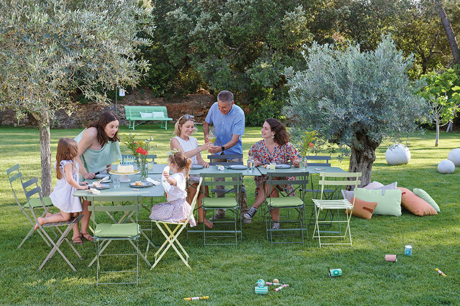 Bistro Tables by Fermob, showing of bistro tables with chairs in the live shot.