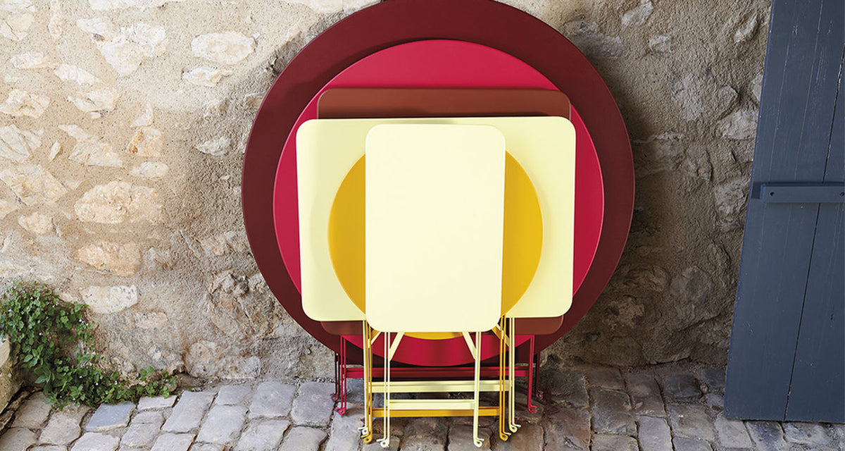 Bistro Rectangular Tables by Fermob, showing fold view of bistro rectangular tables in live  shot.