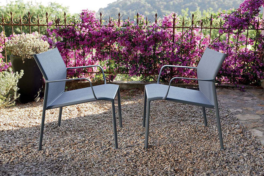 Cadiz Low Armchair (Set of 4) by Fermob, showing cadiz low armchair (set of 4) in live shot.