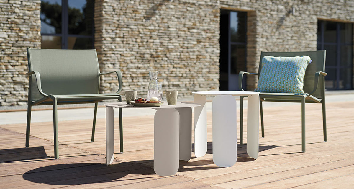 Cadiz Low Armchair (Set of 4) by Fermob, showing cadiz low armchair (set of 4) in live shot.