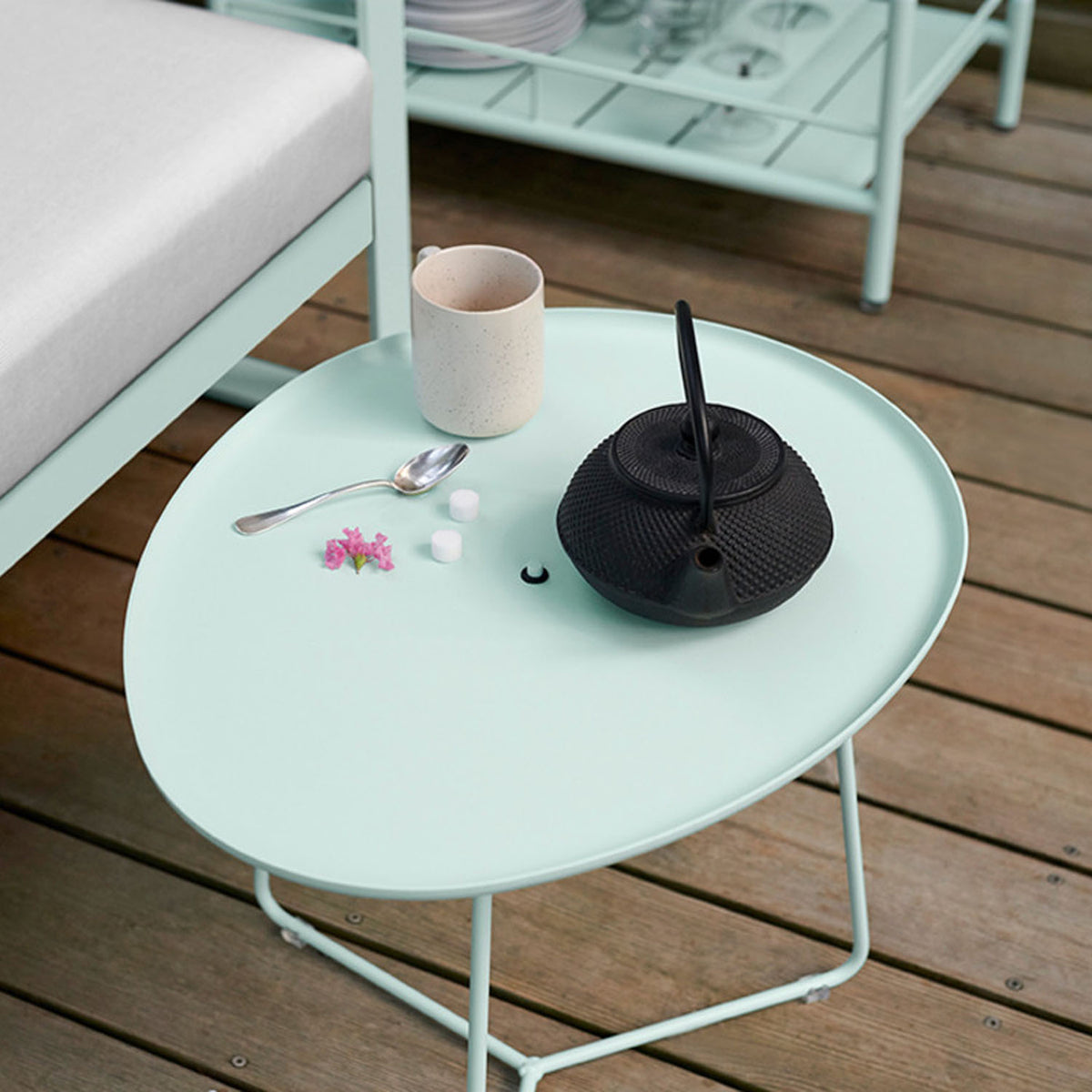 Cocotte Low Table with Removable Tray by Fermob, showing cocotte low table with removable tray in live shot.