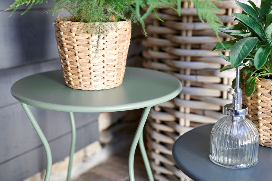 Cocotte Stool by Fermob, showing closeup view of cocotte stool in live shot.