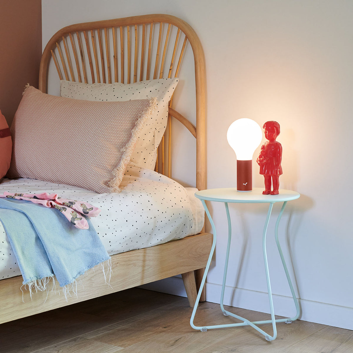 Cocotte Stool by Fermob, showing cocotte stool in live shot.