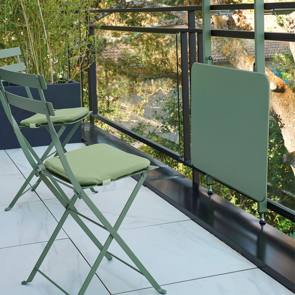 Color Mix Bistro Outdoor Cushion by Fermob, showing color mix bistro outdoor cushion in live shot.