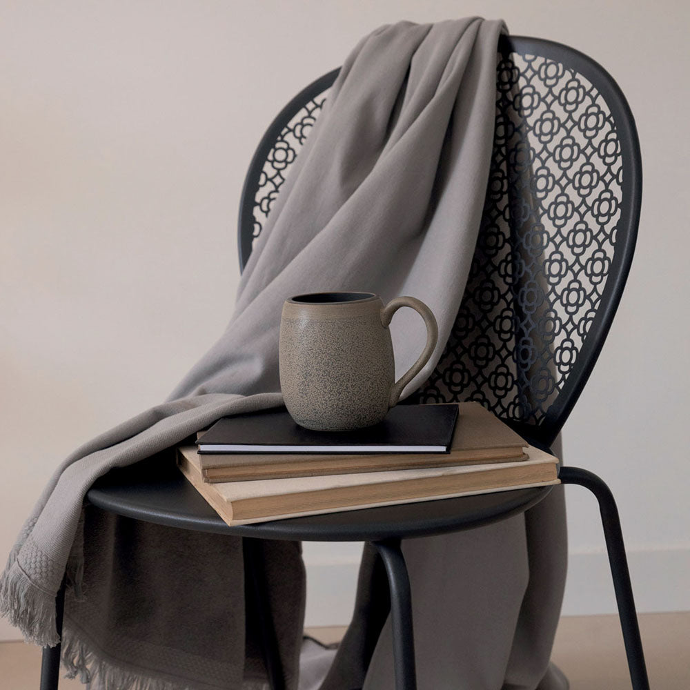 Color Mix Fouta Towel by Fermob, showing color mix fouta towel in live shot.
