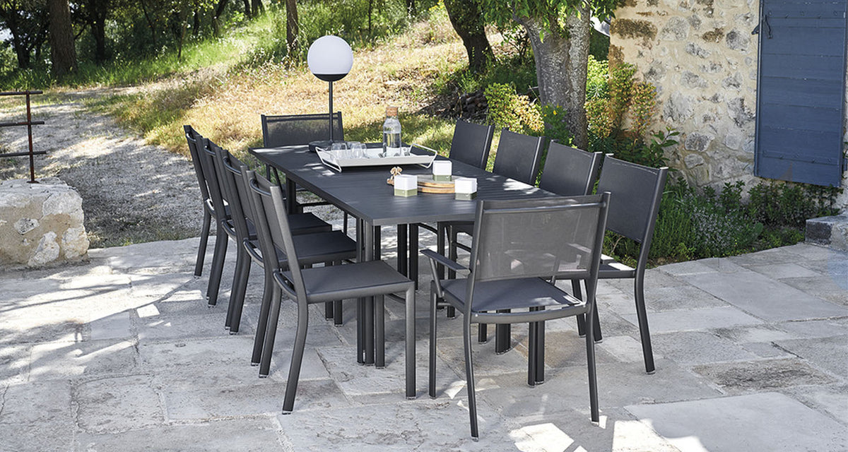 Costa Extending Dining Table by Fermob, showing costa extending dining table in live shot.