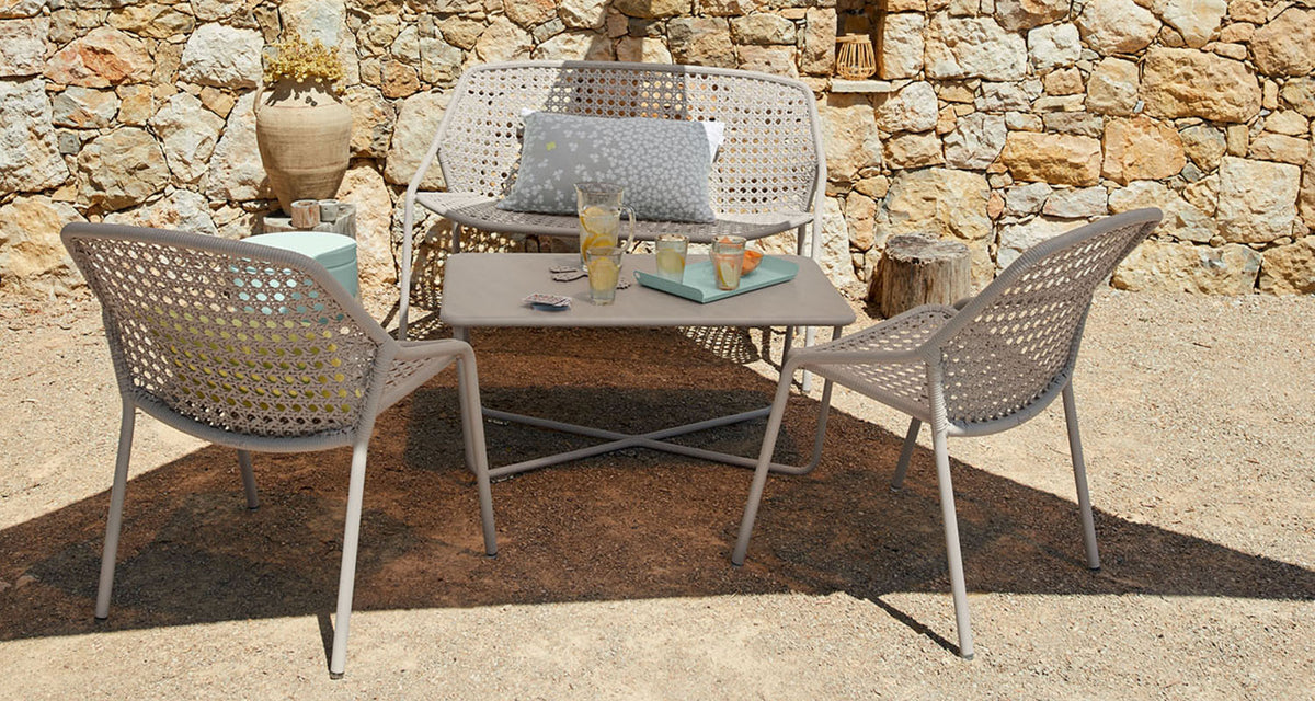 Croisette Armchair (Set of 4) by Fermob, showing croisette armchair (set of 4) in live shot.