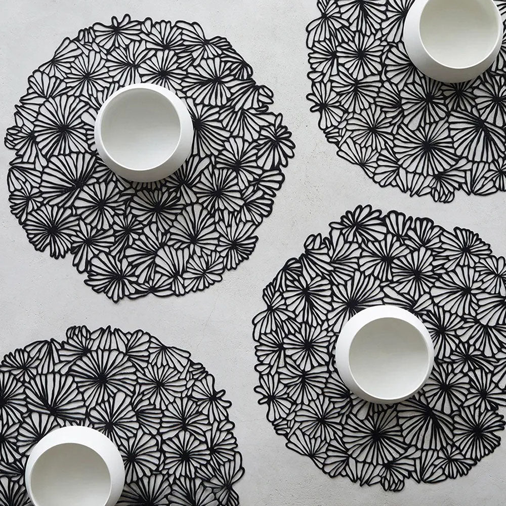 Daisy Round Placemats by Chilewich, showing daisy round placemats in live shot.