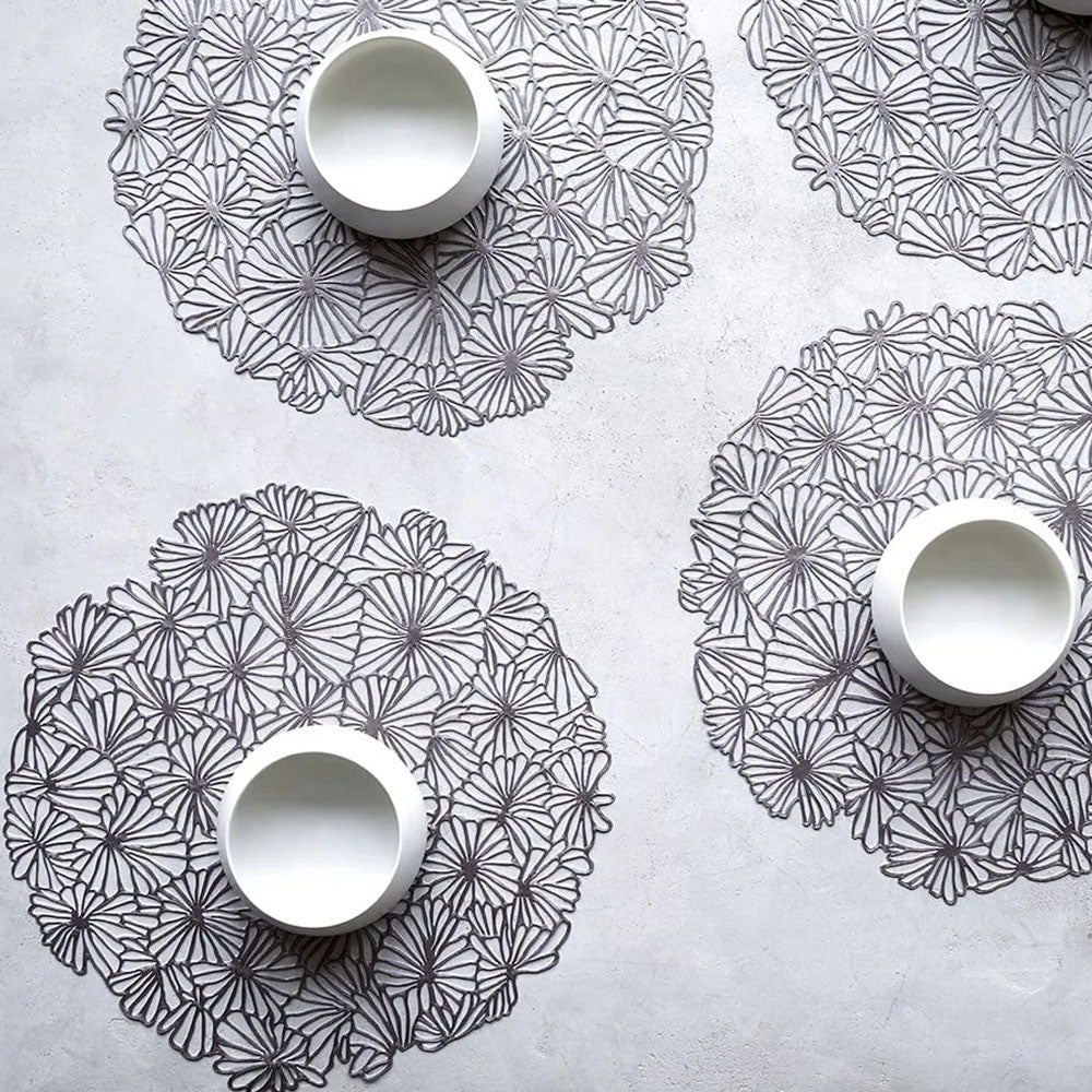 Daisy Round Placemats by Chilewich, showing daisy round placemats in live shot.
