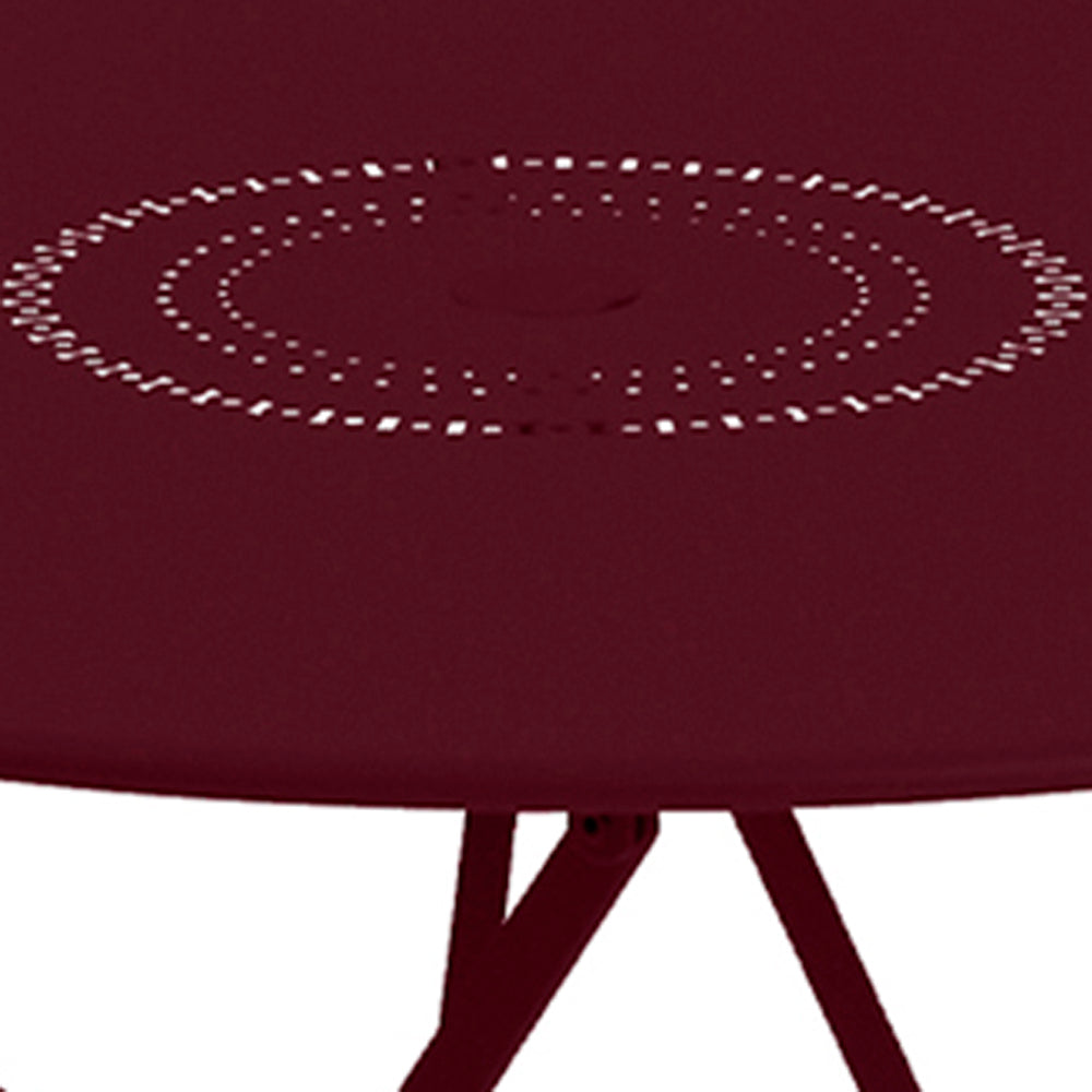 Floreal Perforated Round Tables by Fermob, showing closeup view of floreal perforated round tables.