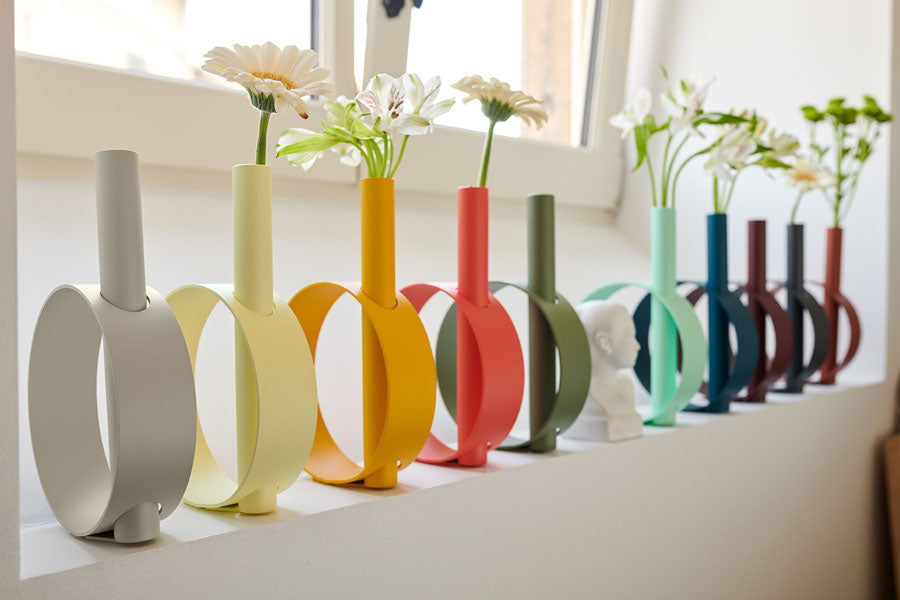 Ios Single Stem Vase by Fermob, showing ios single stem vase in live shot.