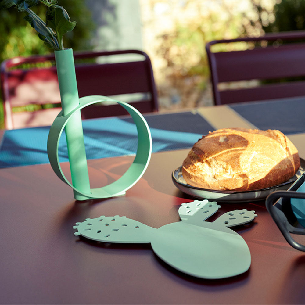 Ios Single Stem Vase by Fermob, showing ios single stem vase in live shot.