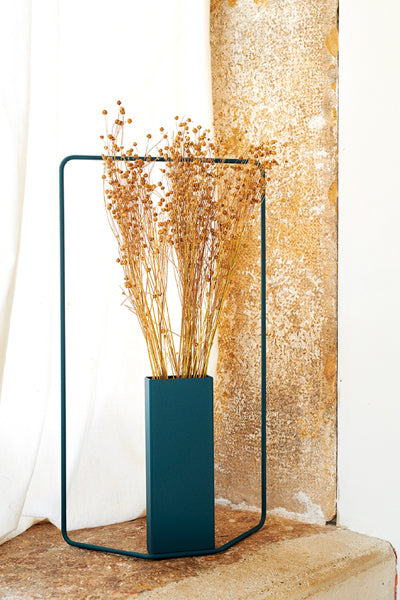 Itac Vase by Fermob, showing itac vase in live shot.